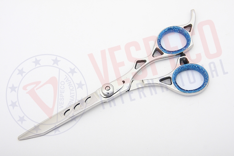 Scissors with holes